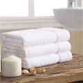 Wholesale super cheap 100% cotton fabric plain dyed size face towel for hotel